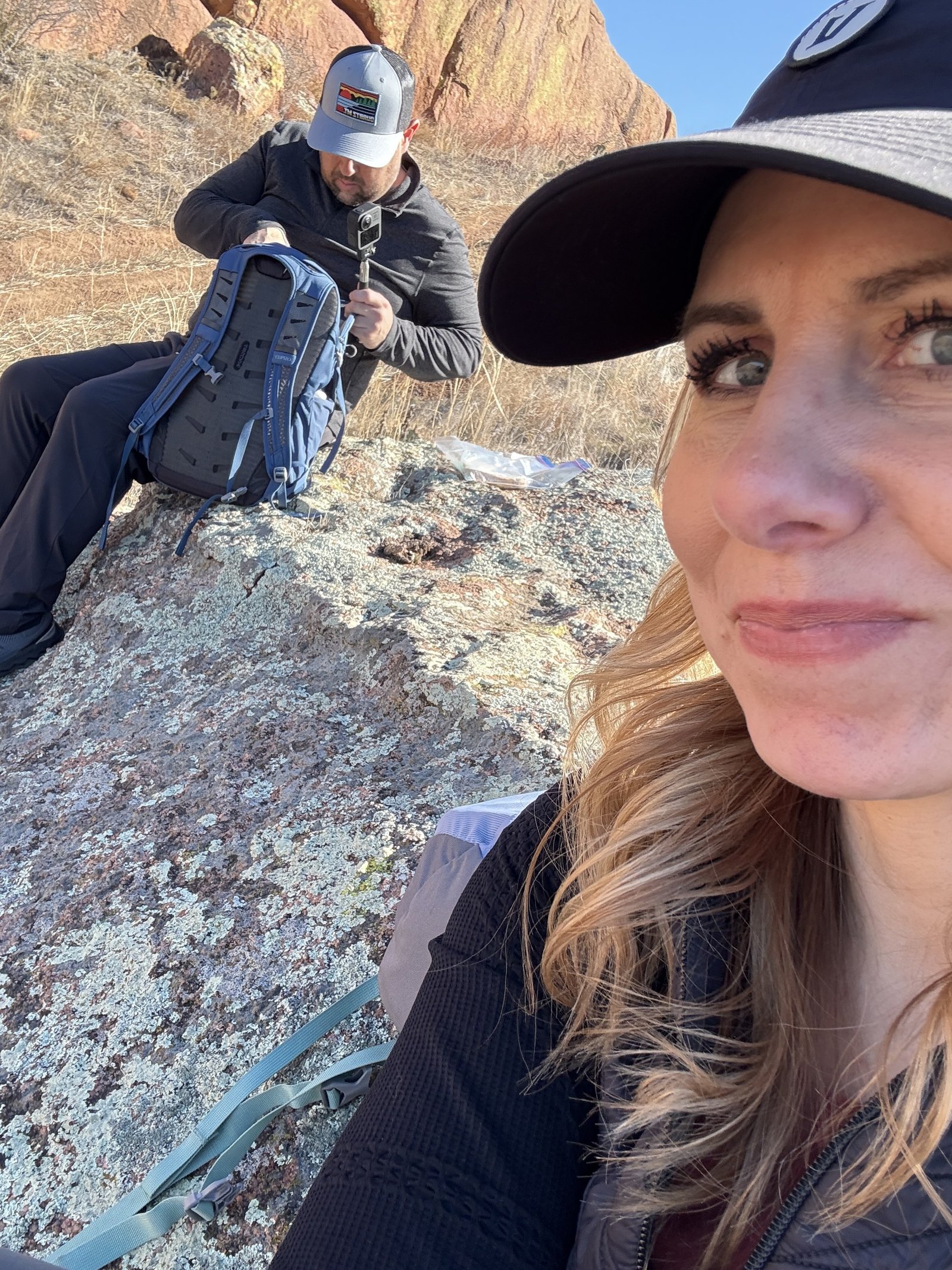 Jason and Melissa on Quartz rocks with a hiking pack